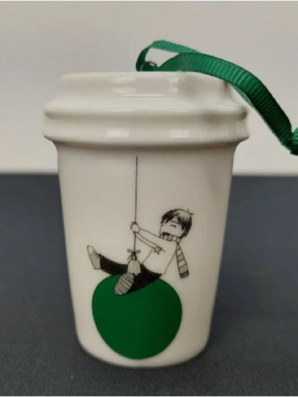 White Ceramic Ornament Vase with Green Accent and Hanging Ribbon
